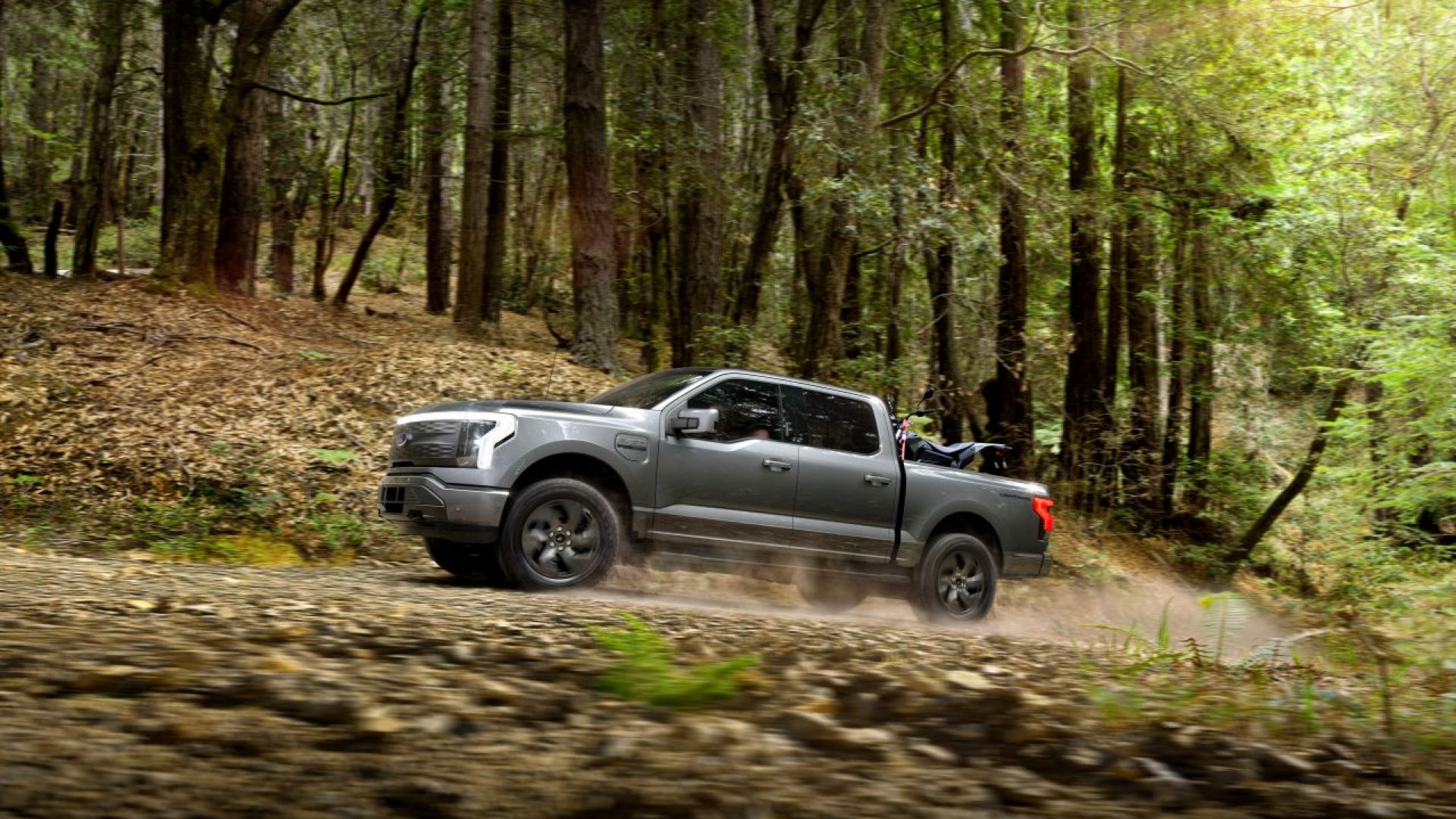 2022 Ford F-150 Lightning Lariat. Pre-production model with available features shown. Available starting spring 2022. Always consult the owner’s manual before off-road driving, know your terrain and trail difficulty and use appropriate safety gear.